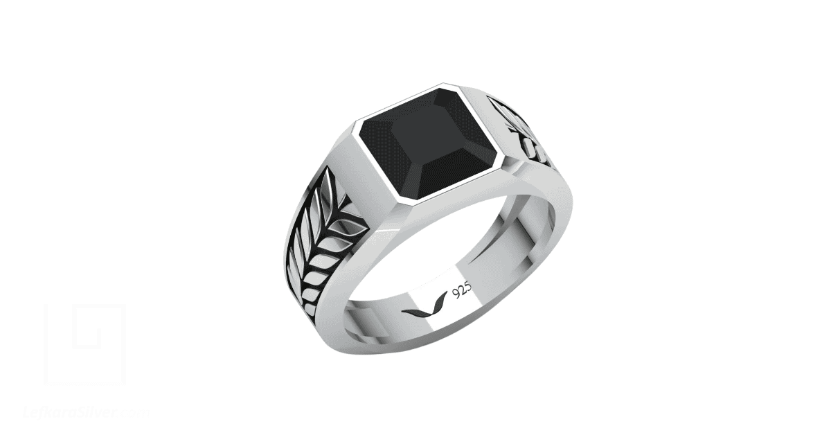 A silver men's jewelry ring with the 925 inscribed on it.