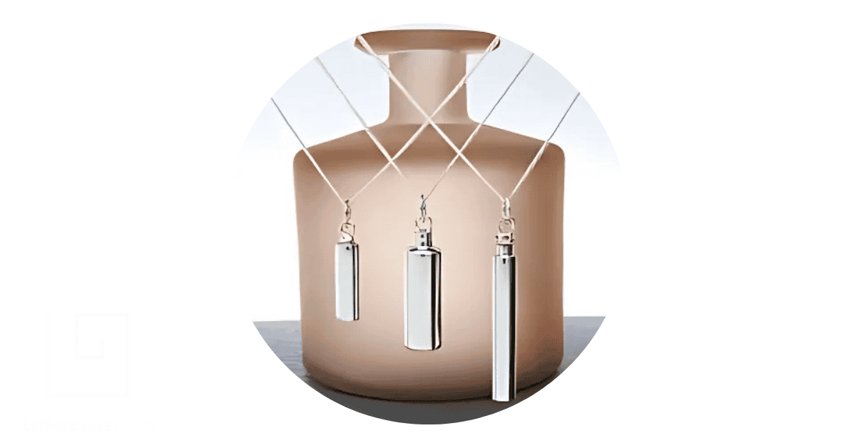 Sterling silver urns as cremation jewelry