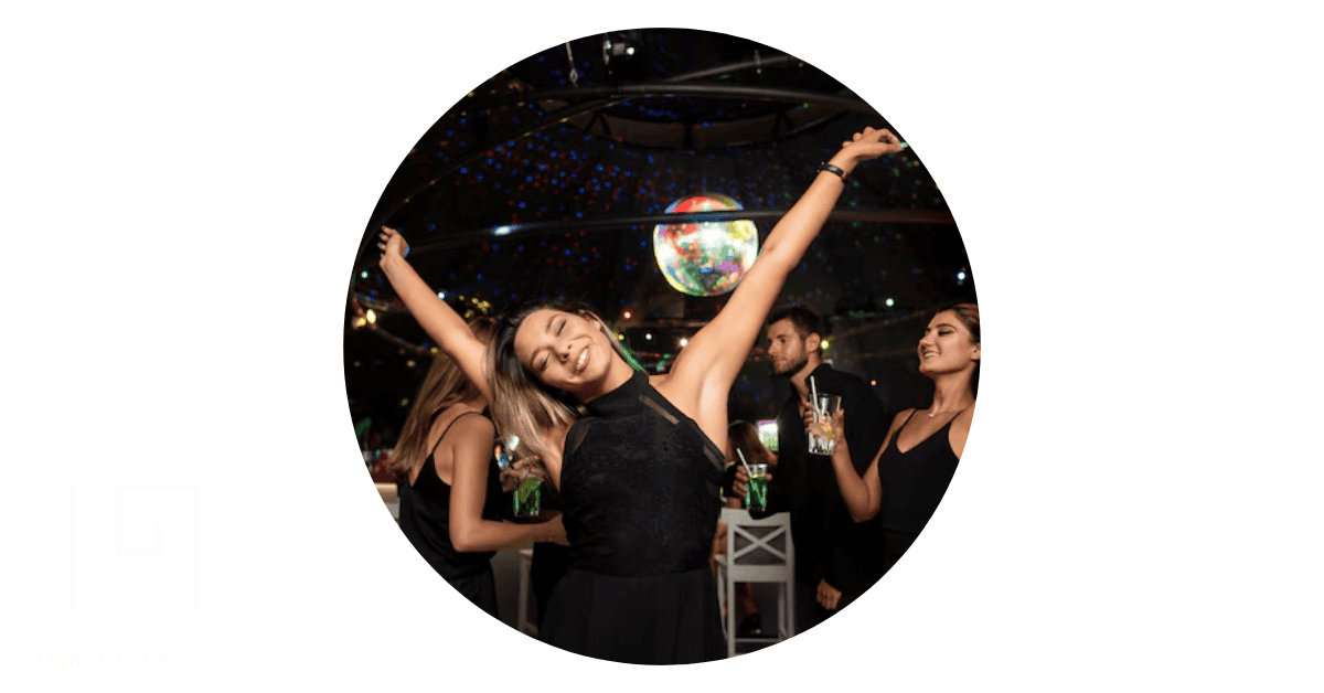 a group of people having fun at a night club
