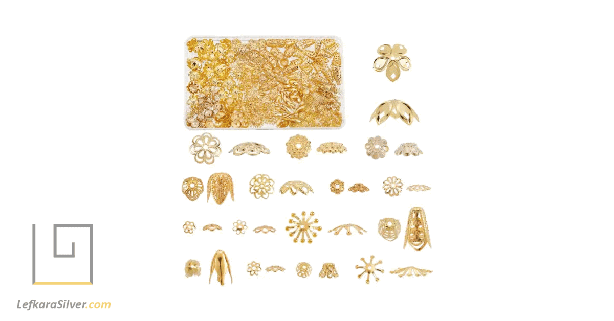 a tray of various filigree findings, with a close-up view of the intricate designs.
