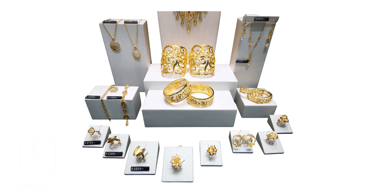 several filigree jewelry designs on display