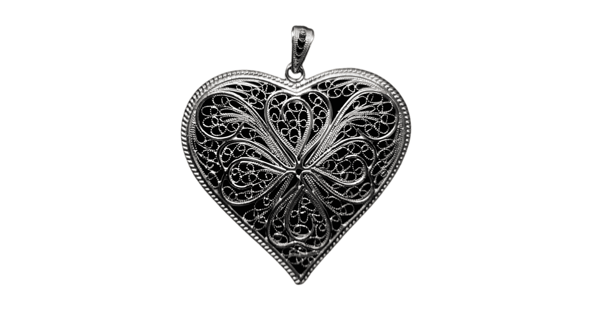 a silver filigree pendant.