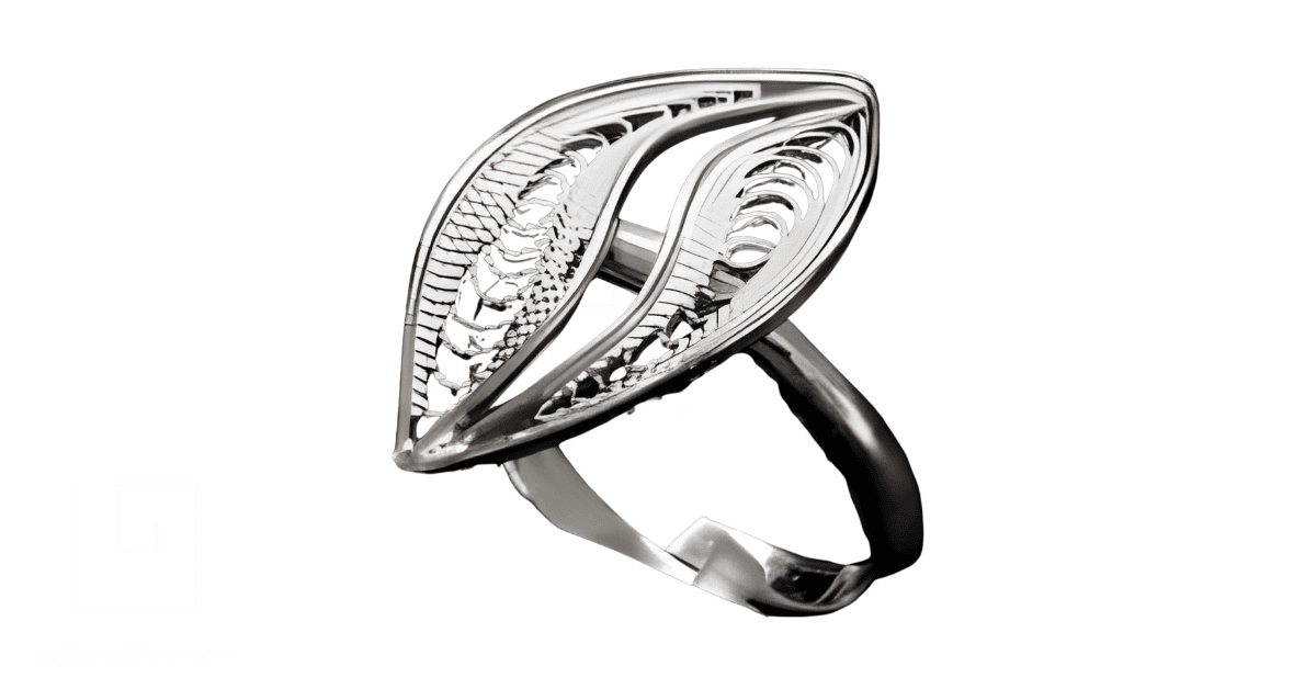 a silver filigree ring