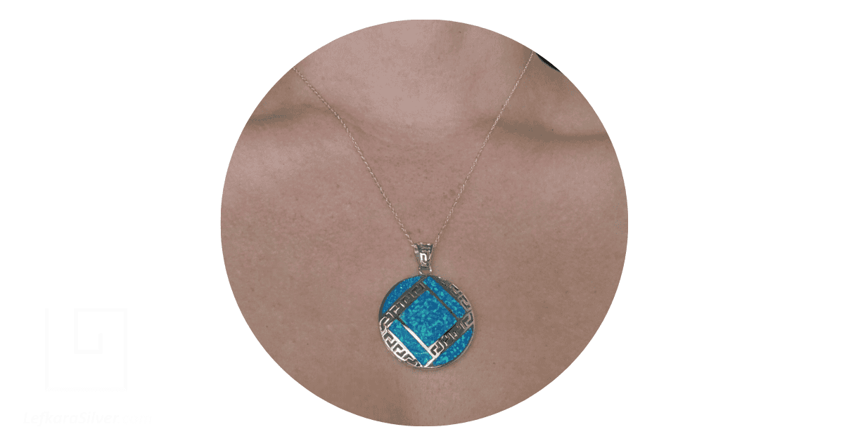 real jewelry in opal and silver necklace on a woman's neck