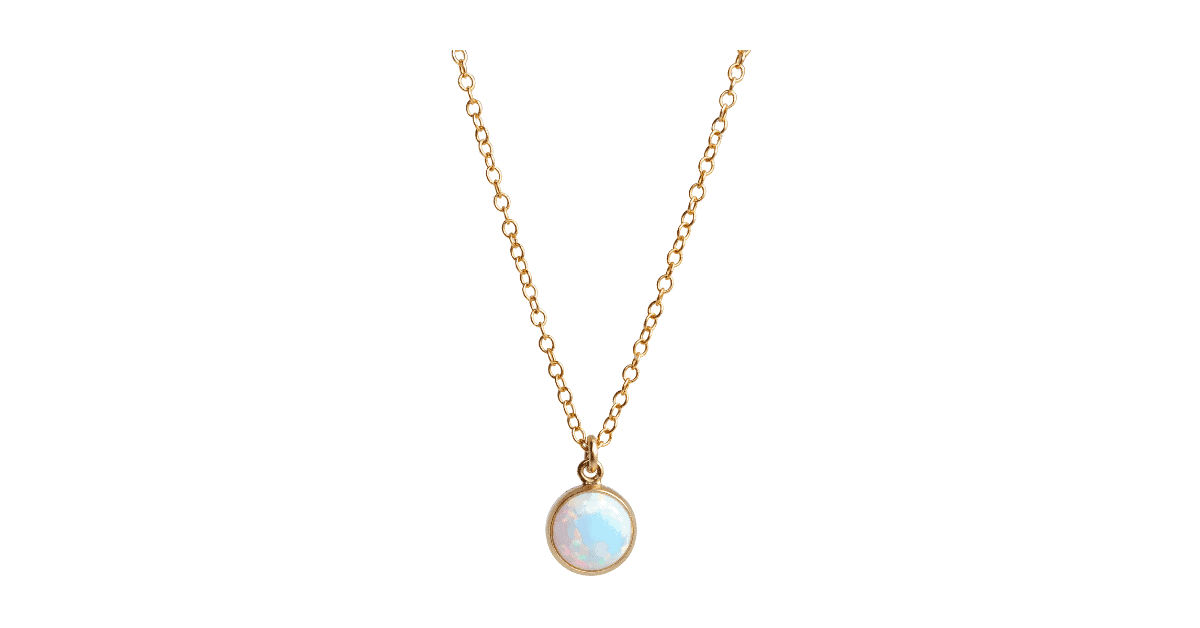 A gold opal necklace.