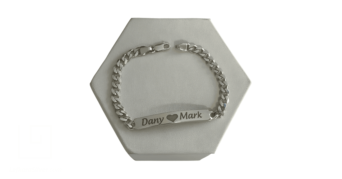 A customized silver bracelet from an Etsy shop.