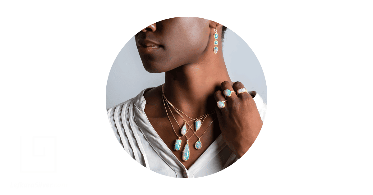 A woman adorned with Ethiopian opal jewelry.