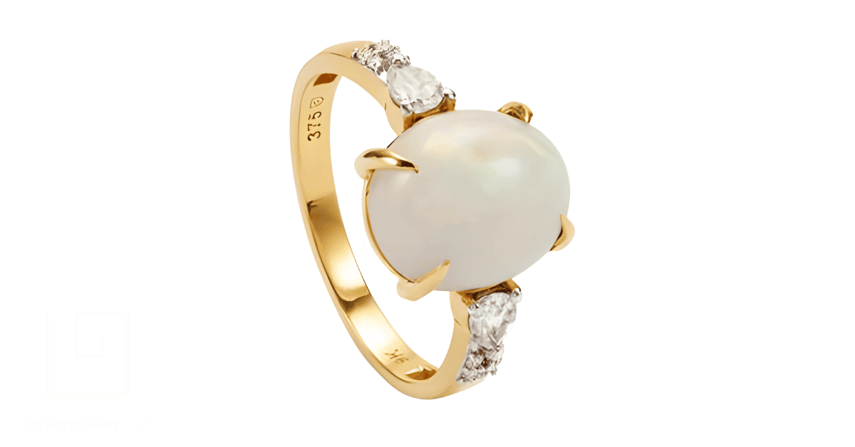 a gold white opal ring. 