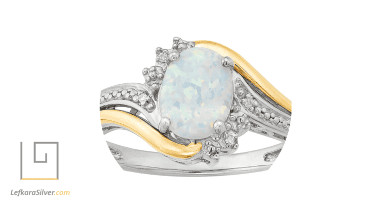 a fine opal inlaid in gold and silver