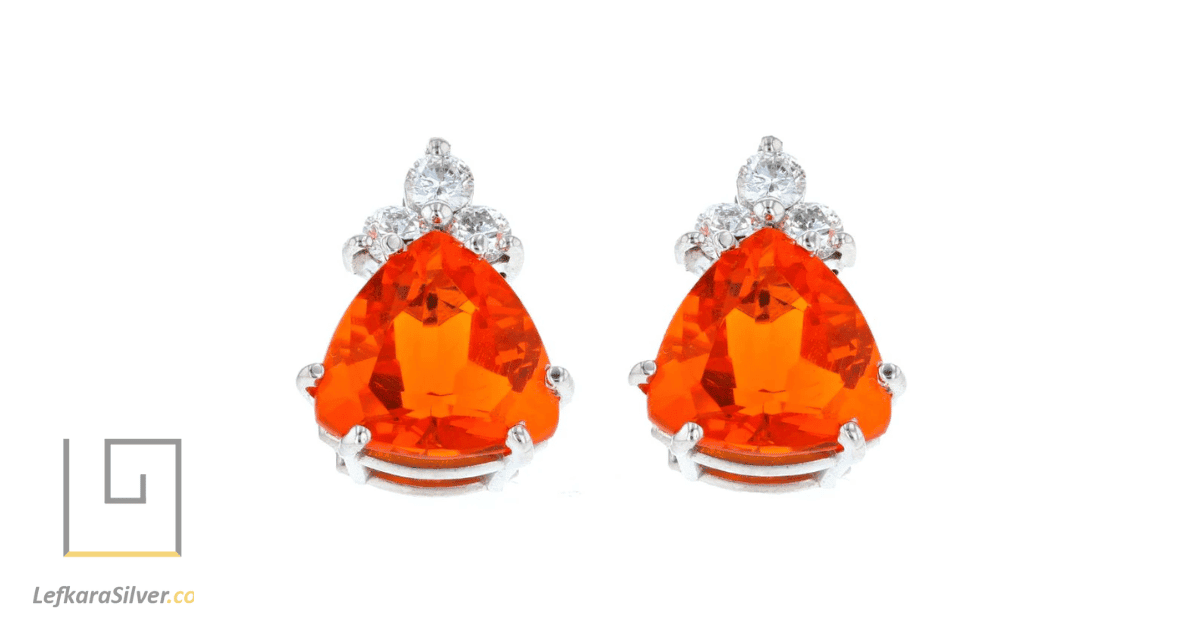 a pair of fire opal earrings