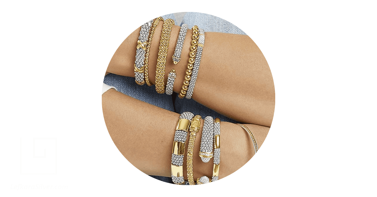 Elegant gold and silver bracelets stacked.