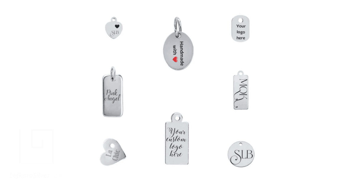 custom jewelry tags in silver on a white background