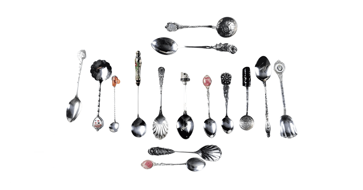 Different silver spoons from different manufacturers.