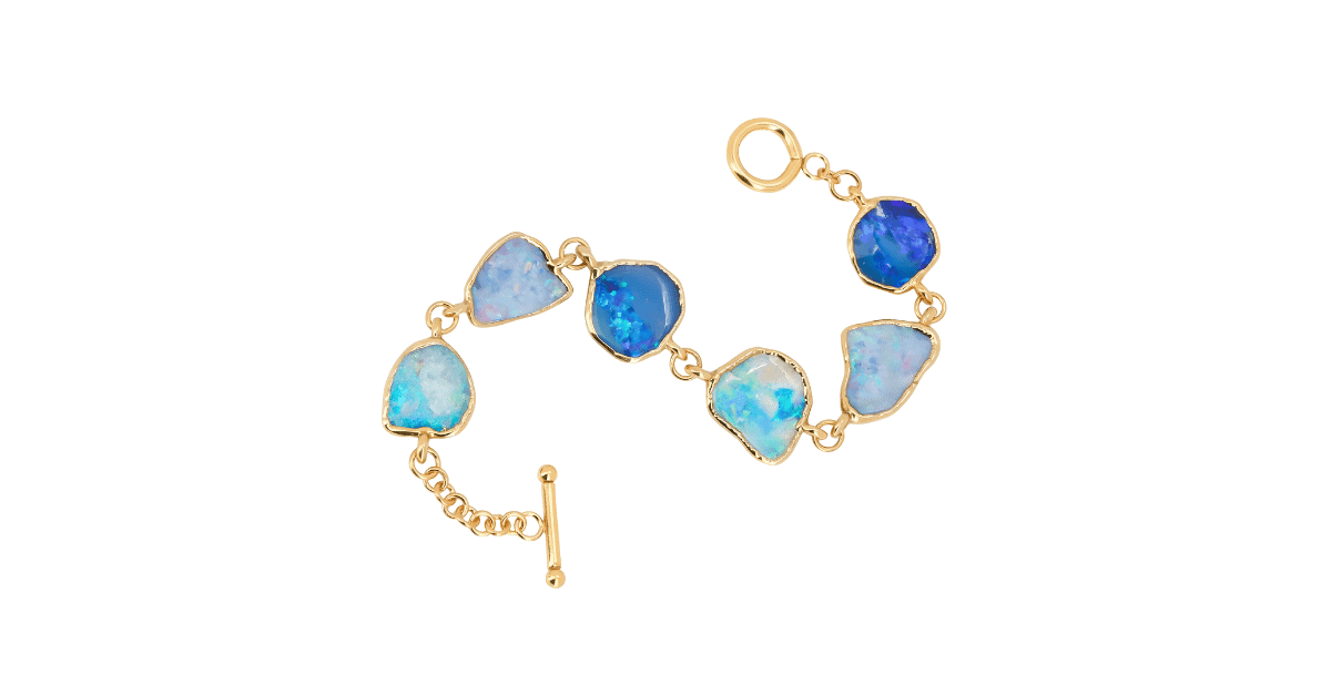 A gold raw opal bracelet.