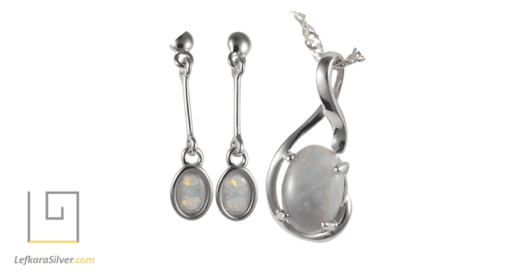 beautiful opal earrings and pendant inlaid in sterling silver