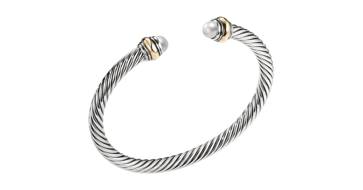 A silver cuff bracelet.