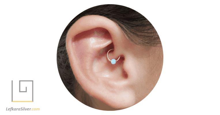 a woman's ear with Opal Daith Jewelry