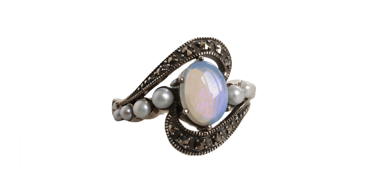A vintage opal and pearl ring. 