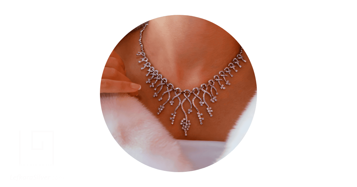 A beautiful necklace around a woman's neck. 