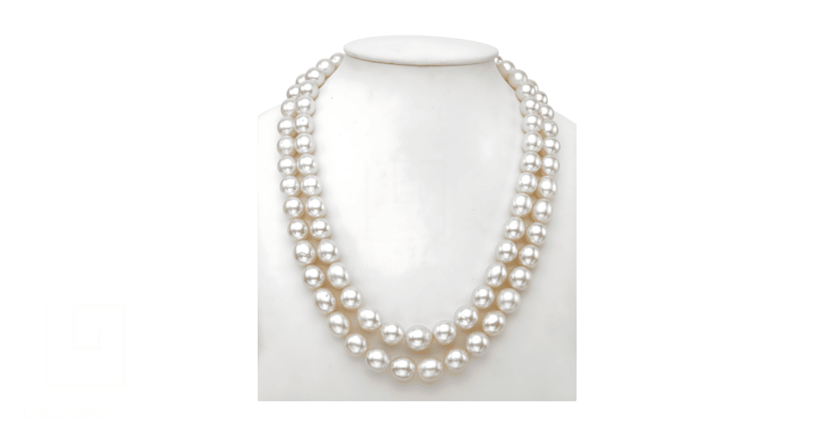 Layered pearl necklaces.