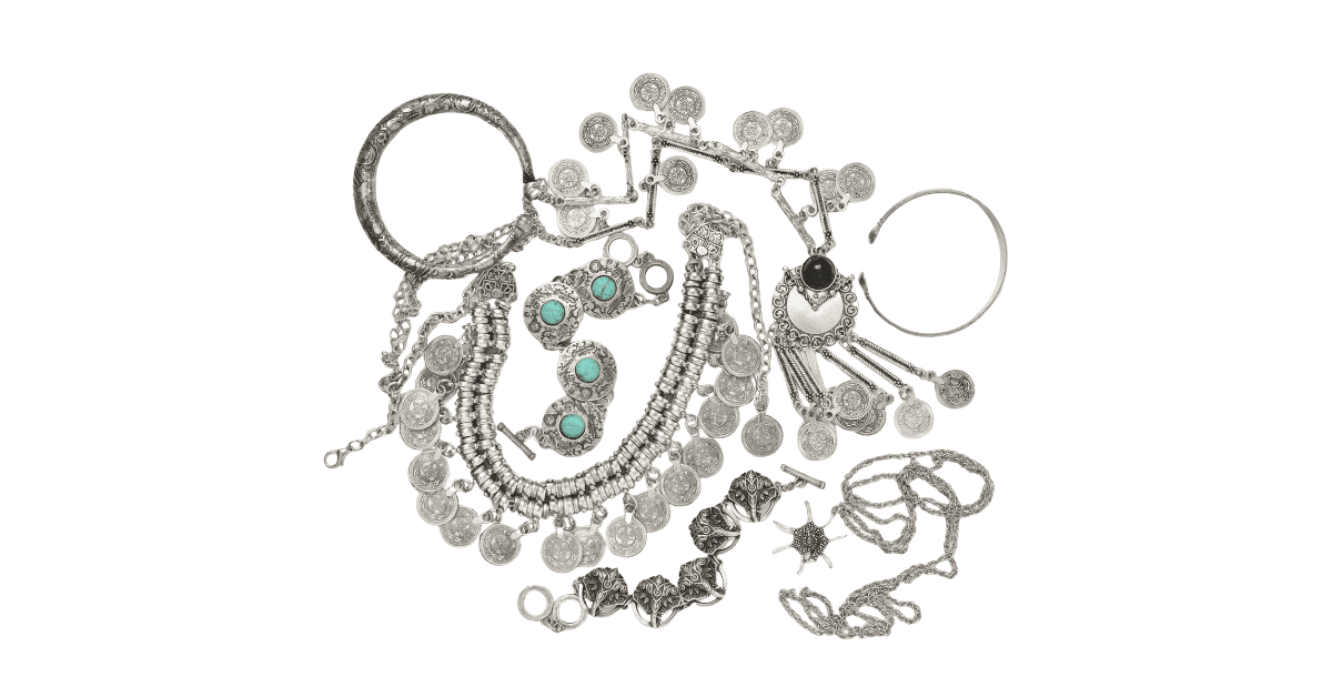a stack of silver jewelry.