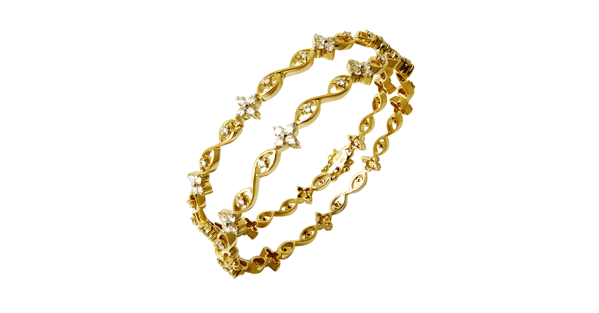 a yellow gold bracelet. 