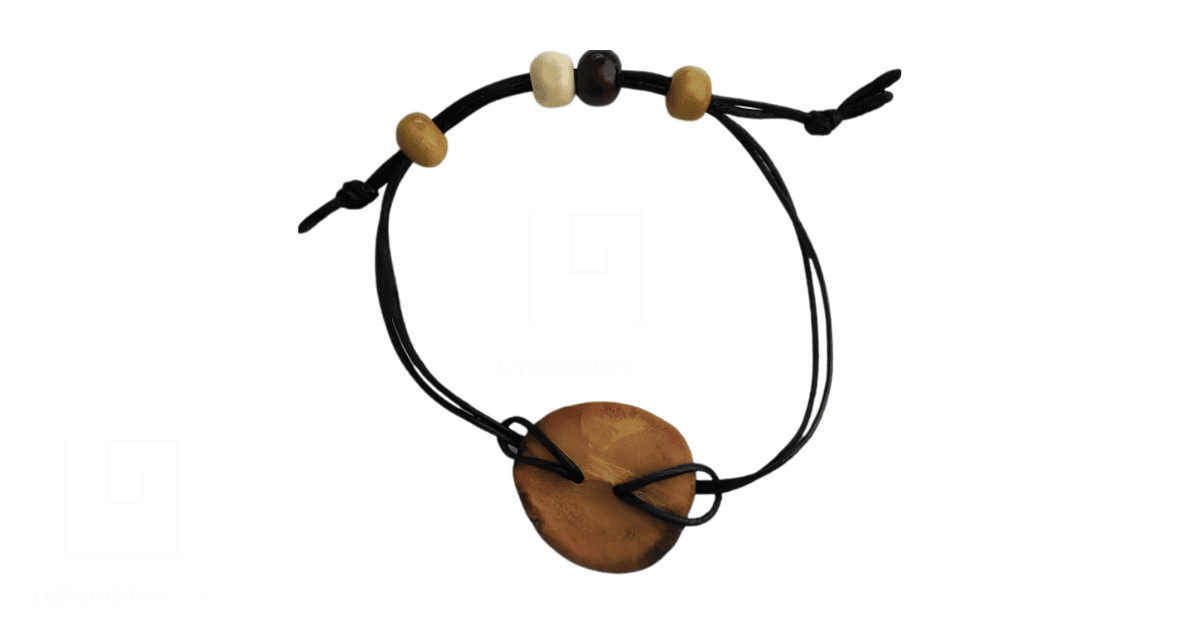 An upcycled Avocado Pit Buttons bracelet.