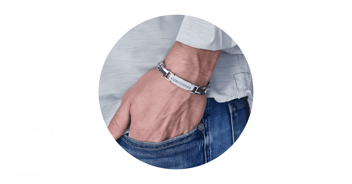  A man wearing a personalized bracelet. 