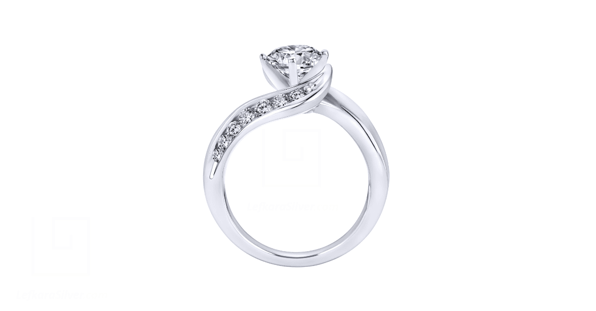 a white gold ring with diamonds.