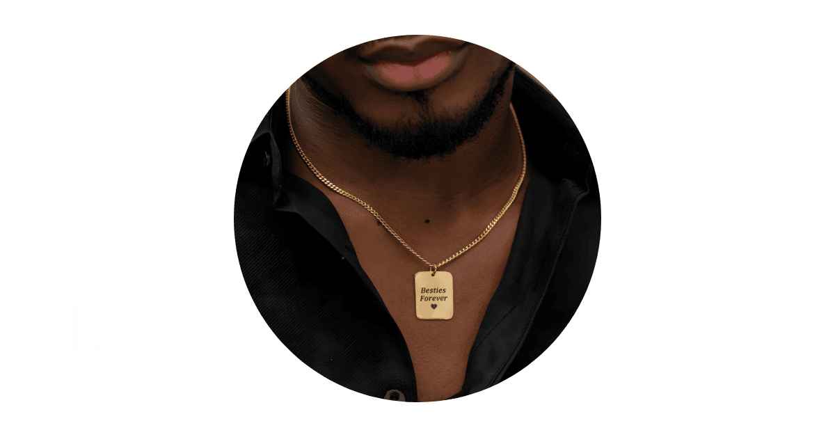 a man's neck adorned with a personalized dog-tag necklace.