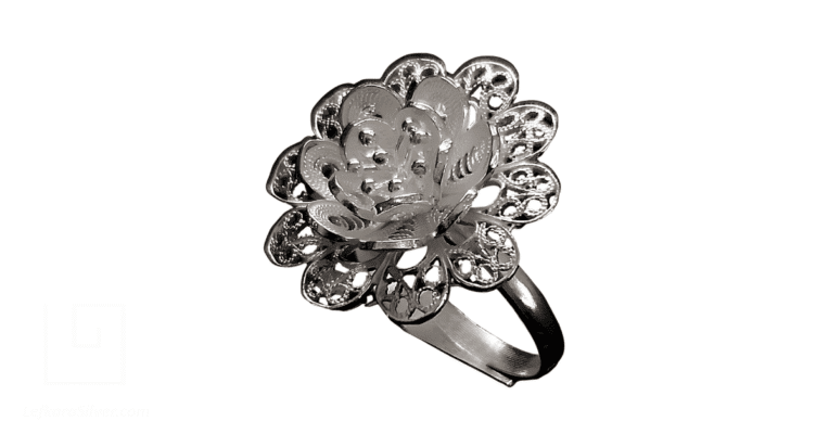 a white gold filigree ring.
