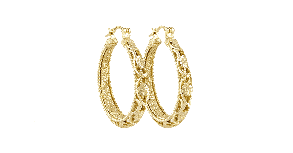 a pair of gold filigree hoop earrings.