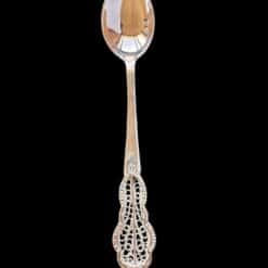 Handmade silver filigree christening teaspoon with an ornate scrolled openwork handle, by Lefkara Silver Cyprus.