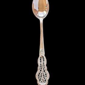 Handmade silver filigree christening teaspoon with an ornate scrolled openwork handle, by Lefkara Silver Cyprus.