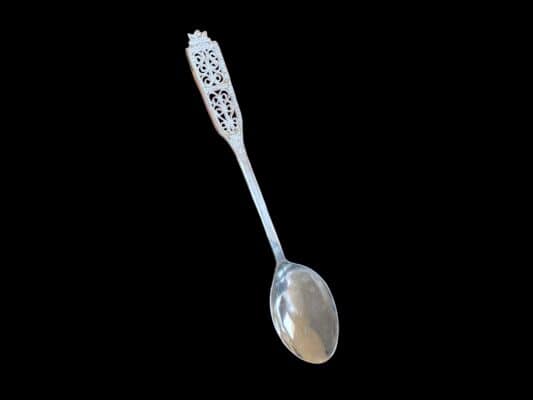 Handmade silver filigree coffee spoon with a flat pierced lace-panel handle, by Lefkara Silver Cyprus.