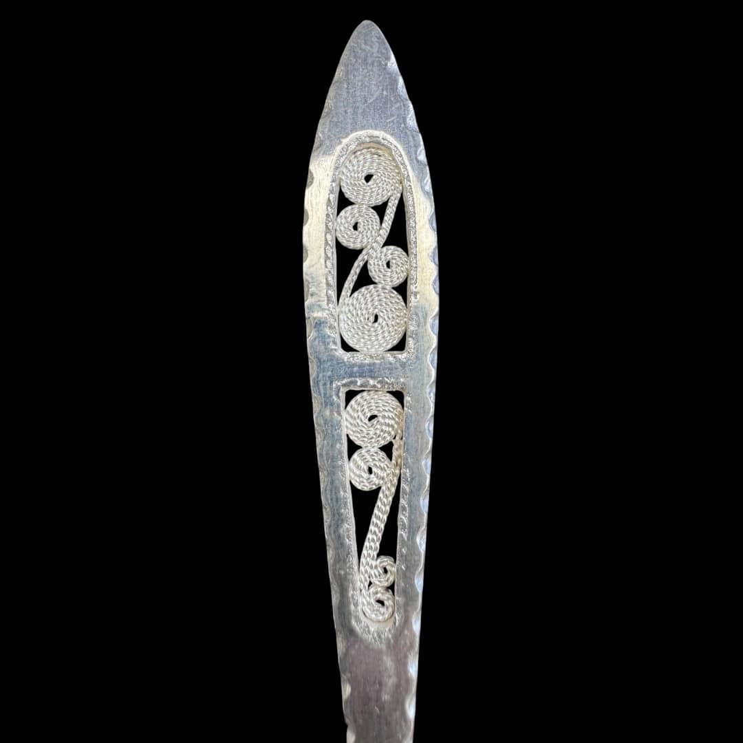 Long handmade silver filigree spoon with a slender lance-shaped openwork handle, by Lefkara Silver Cyprus.