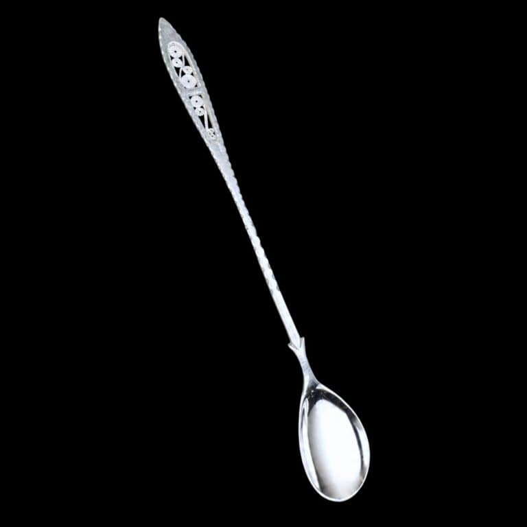 Long handmade silver filigree spoon with a slender lance-shaped openwork handle, by Lefkara Silver Cyprus.