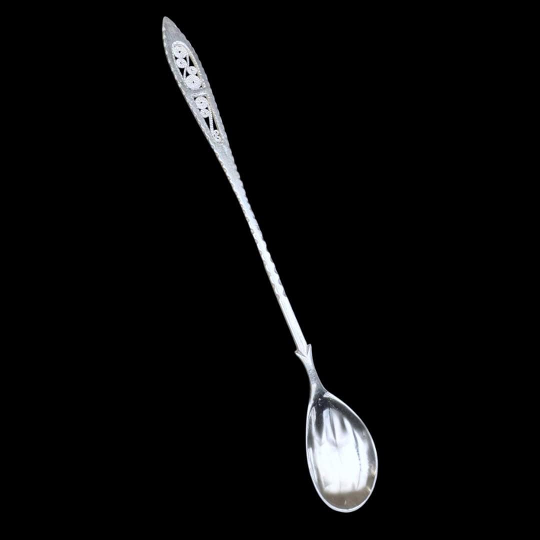 Long handmade silver filigree spoon with a slender lance-shaped openwork handle, by Lefkara Silver Cyprus.