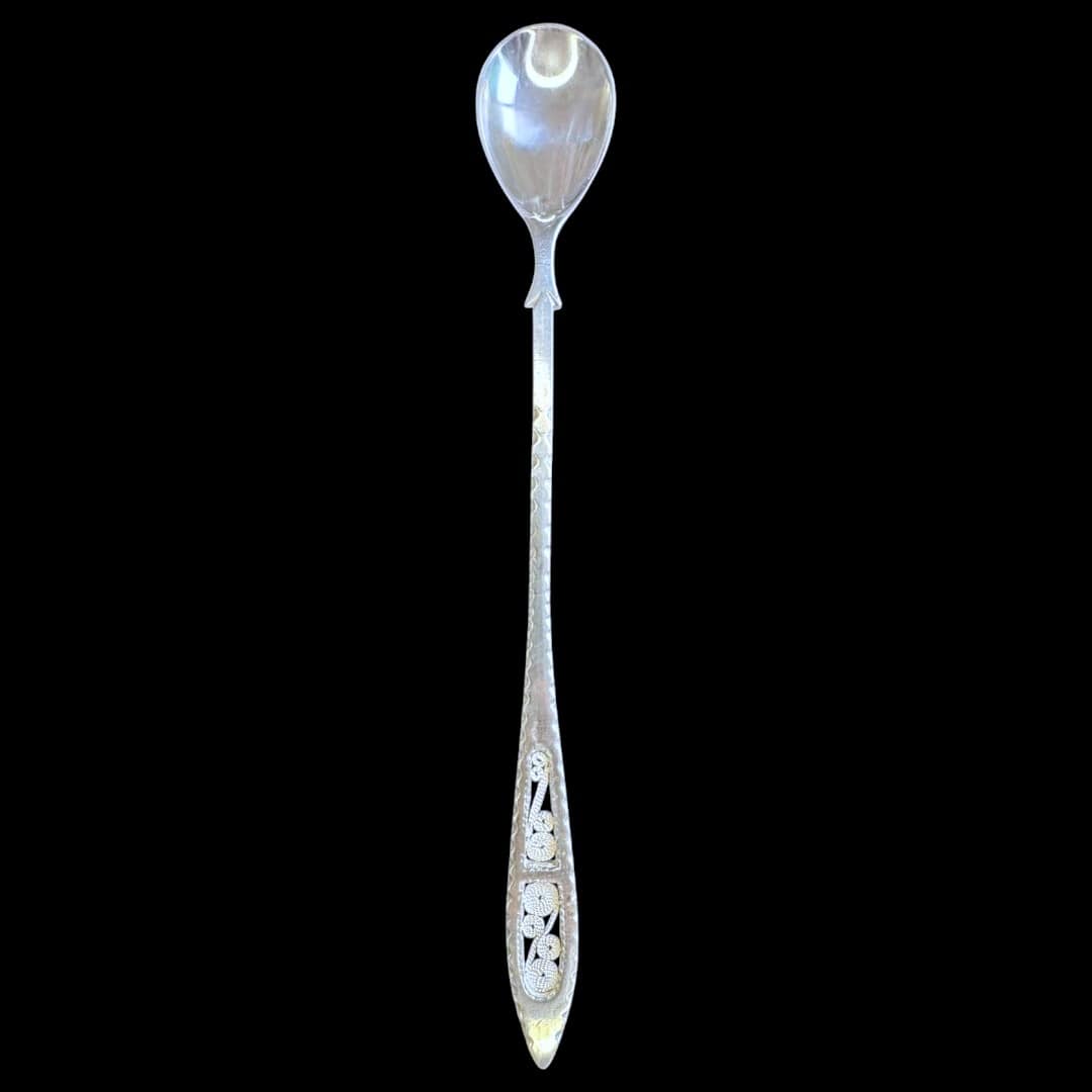 Long handmade silver filigree spoon with a slender lance-shaped openwork handle, by Lefkara Silver Cyprus.