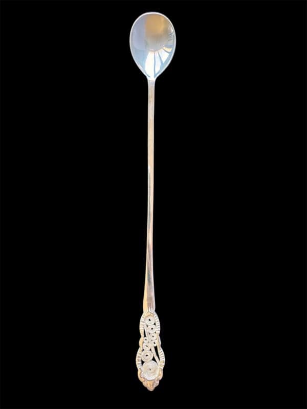 Handmade silver filigree spoon with a rosette openwork handle, by Lefkara Silver Cyprus.