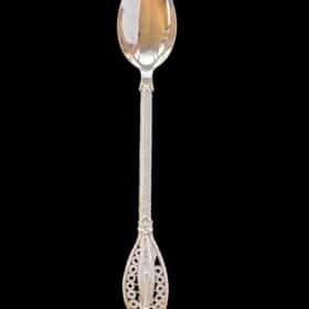Handmade silver filigree spoon with a twisted stem and teardrop openwork handle, by Lefkara Silver Cyprus.