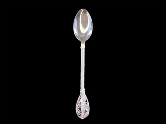 Handmade silver filigree spoon with a twisted stem and teardrop openwork handle, by Lefkara Silver Cyprus.