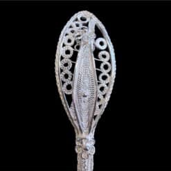 Handmade silver filigree spoon with a twisted stem and teardrop openwork handle, by Lefkara Silver Cyprus.