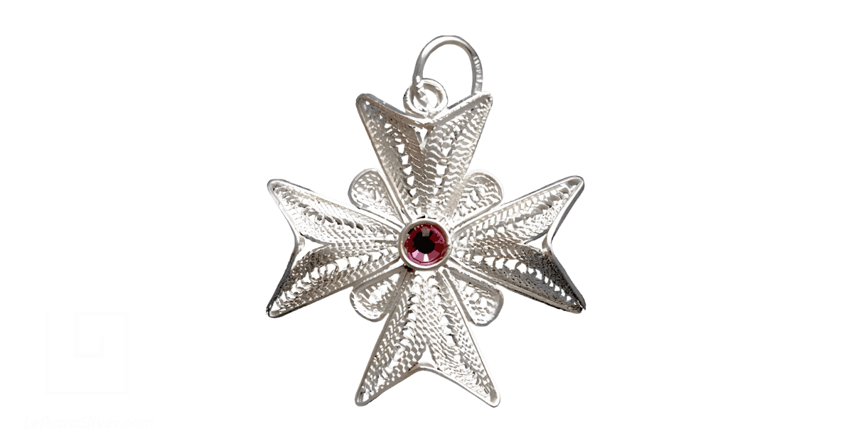 A silver Maltese filigree pendant.