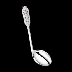 Handmade silver baby feeding spoon with an elongated bowl and lacelike filigree handle, by Lefkara Silver Cyprus.
