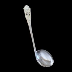 Handmade silver baby feeding spoon with an engraved pierced medallion handle, by Lefkara Silver Cyprus.
