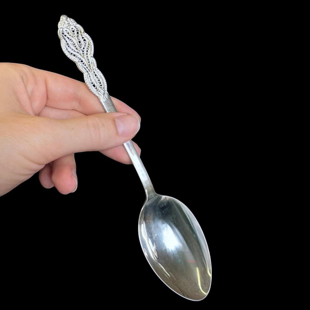 Large handmade silver filigree serving spoon with a grand scrolled openwork handle, by Lefkara Silver Cyprus.